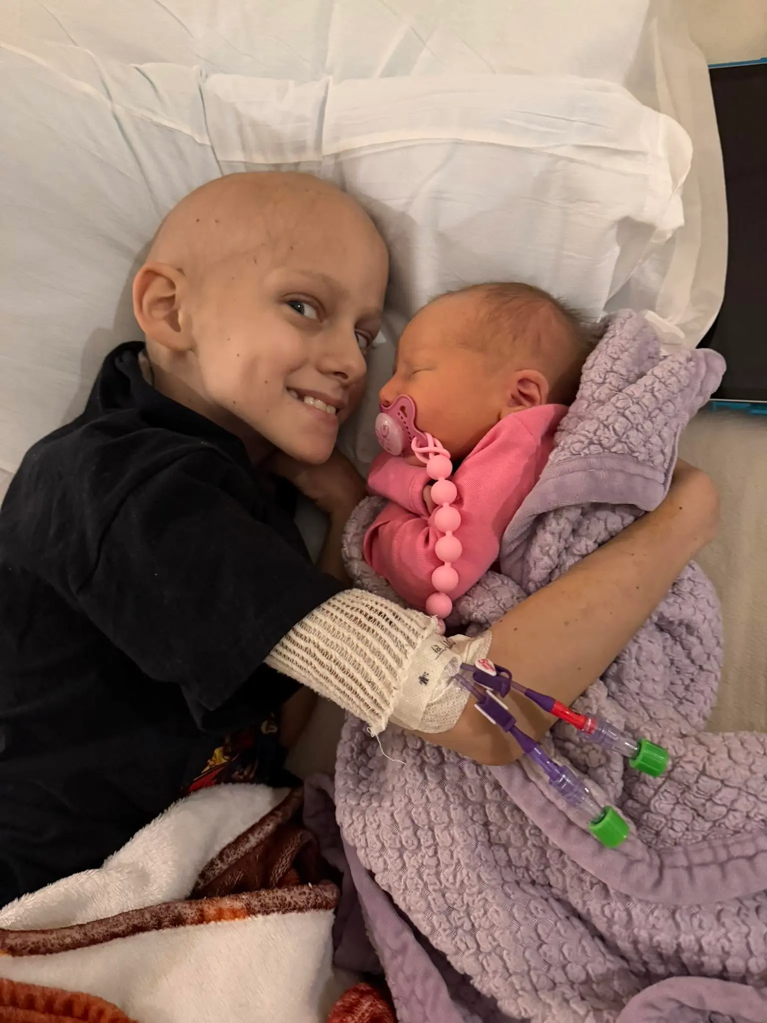 Gavin with his baby sister Isabella